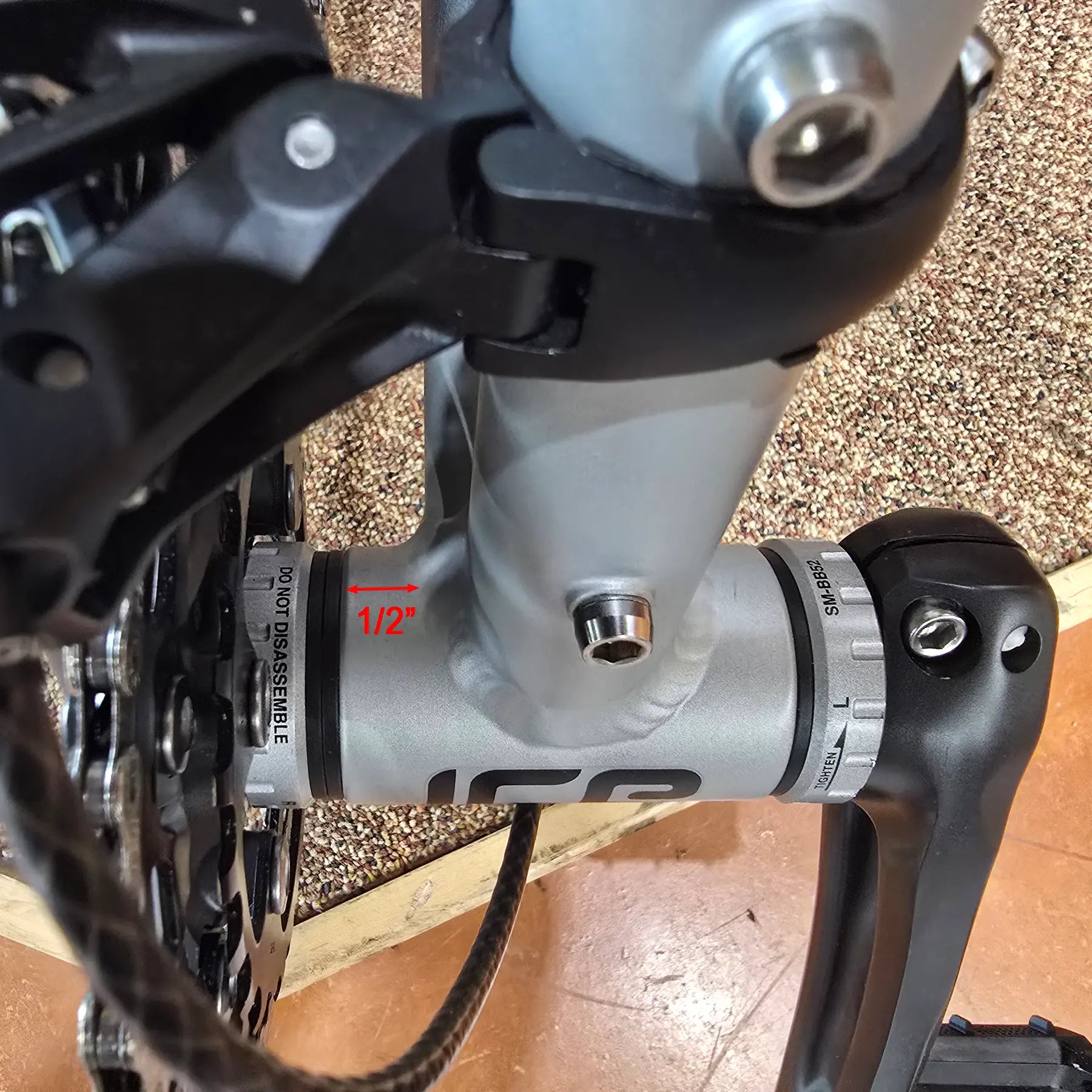 View of how to measure the bottom bracket to ensure proper fit of the ICE Chainring Guard.