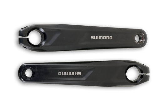 A top view of a pair of black ICE Take-Off Shimano Steps EP6 170mm Crankarms with Slots with the Shimano logo in white. 