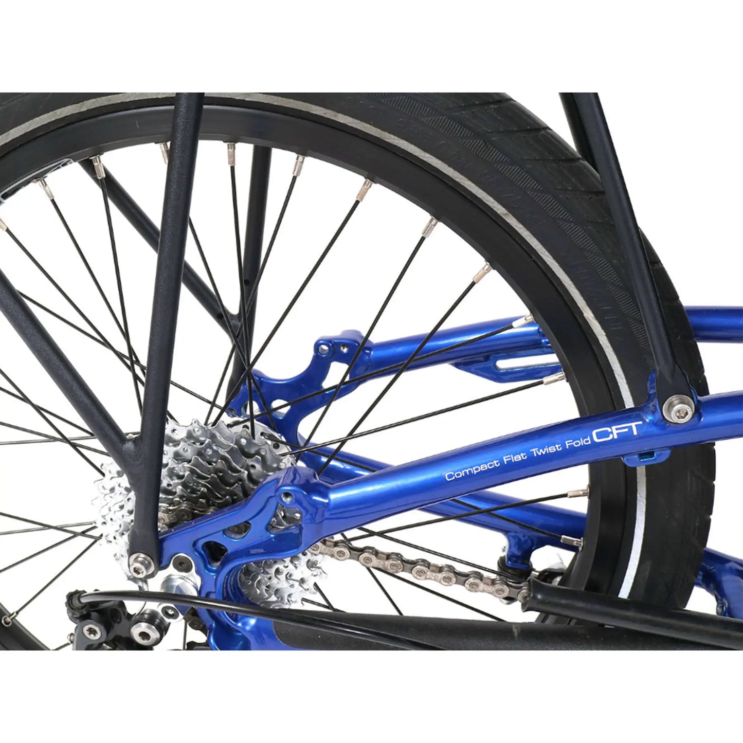 Closeup view of the ICE 20 Inch Rigid Rear Rack in black mounted on a blue trike against a white background.