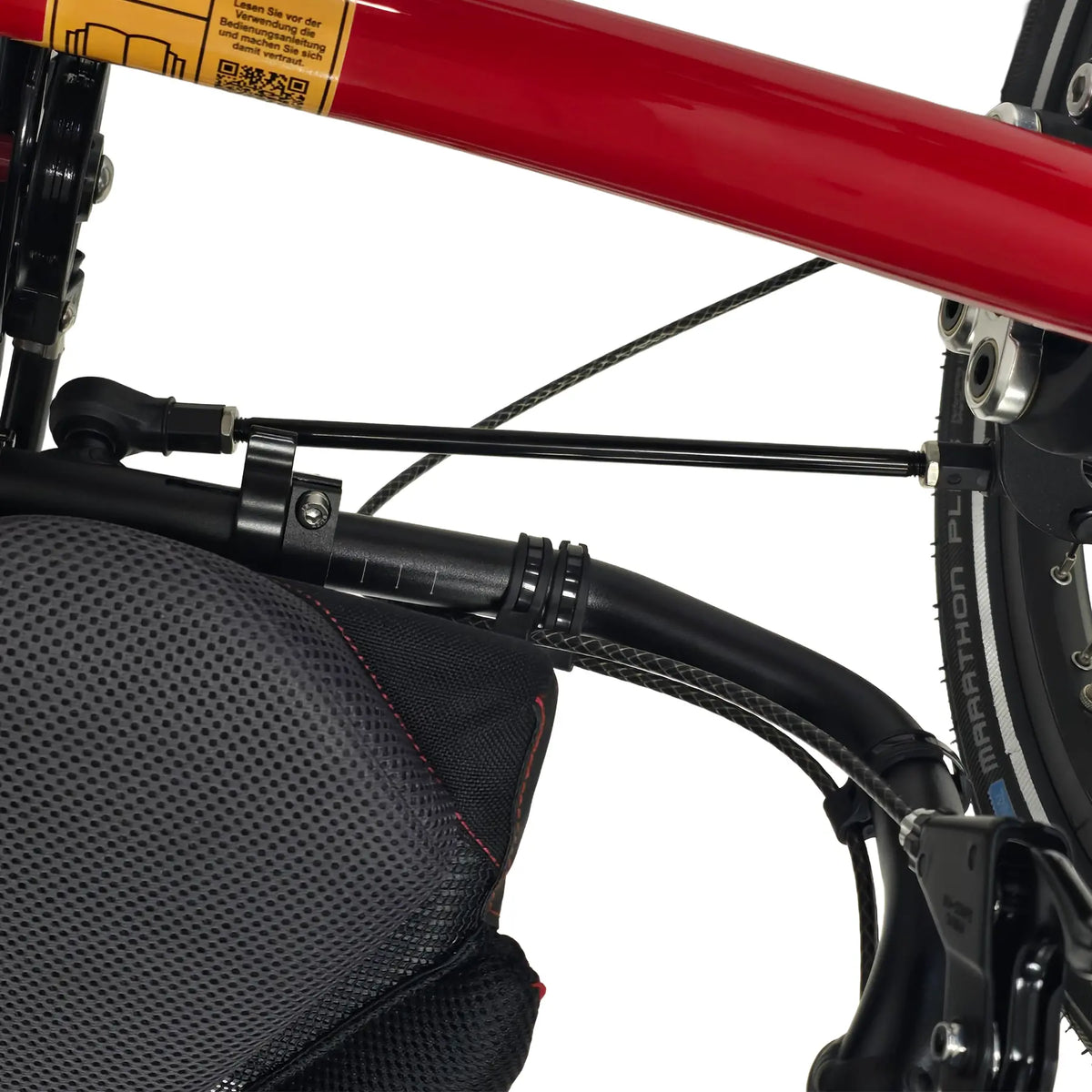Closeup view of the ICE Trikes Adventure, Sprint or 2016 and Later VTX Track Rod in black on a Sprint X Tour Recumbent Trike against a white background.