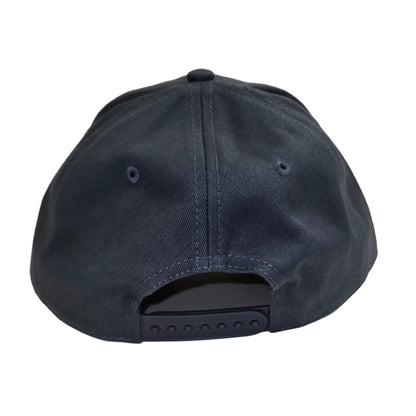 Back view of the ICE Trucker Cap in Petrol Blue with an adjustable back against a white background. 
