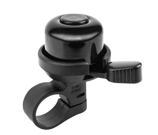 A black plastic bicycle bell with a thumb lever, shown on a plain white background.
