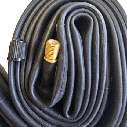 Closeup view of a schrader style valve head on a black bicycle inner tube against a white background.