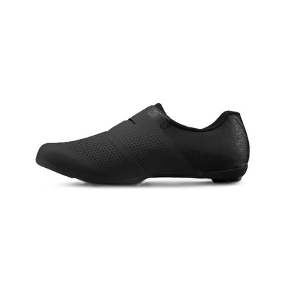 Inside profile view of black Shimano SH-RC302 Women's cycling shoe on white background. 