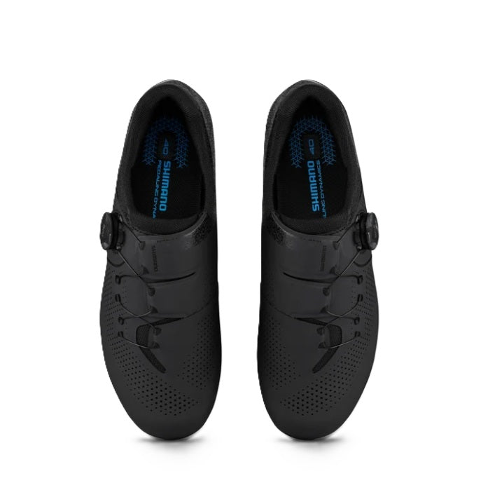 Top down view of a pair of Shimano SH-RC302 Women's black cycling shoe on a white background. 
