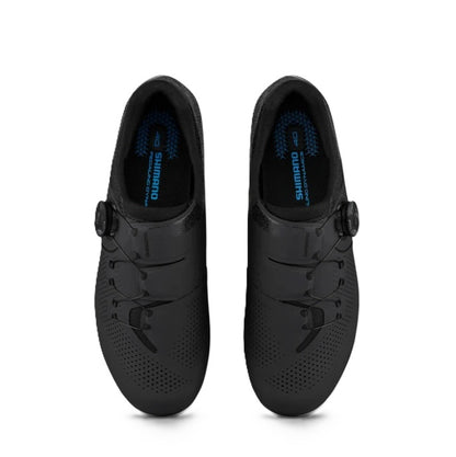 Top down view of a pair of Shimano SH-RC302 Women's black cycling shoe on a white background. 