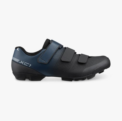 Navy and black Shimano SH-XC102W cycling show with three velcro straps and white XC1 lettering along heel.