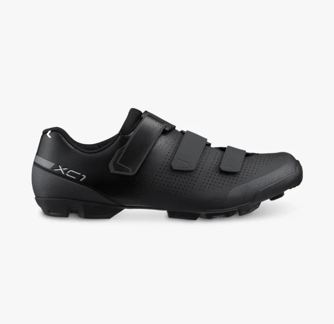 Black Shimano SH-XC102 cycling shoe with 'XC1' branding on a white background.