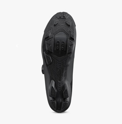 Black Shimano SH-XC320 cycling shoe shoe sole on a white background