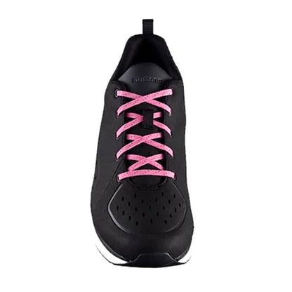 Top view of the Shimano Women's CT500W Cycling Shoes in Black with Pink laces and a white and black sole against a white background.