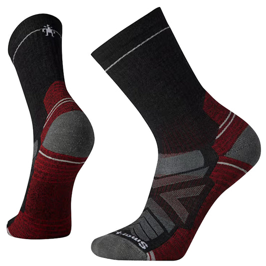 Black, red, and gray hiking socks with a Smartwool logo against a white background.
