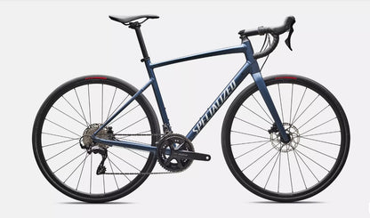 Profile of blue Specialized Allez e5 road bicycle on a white background