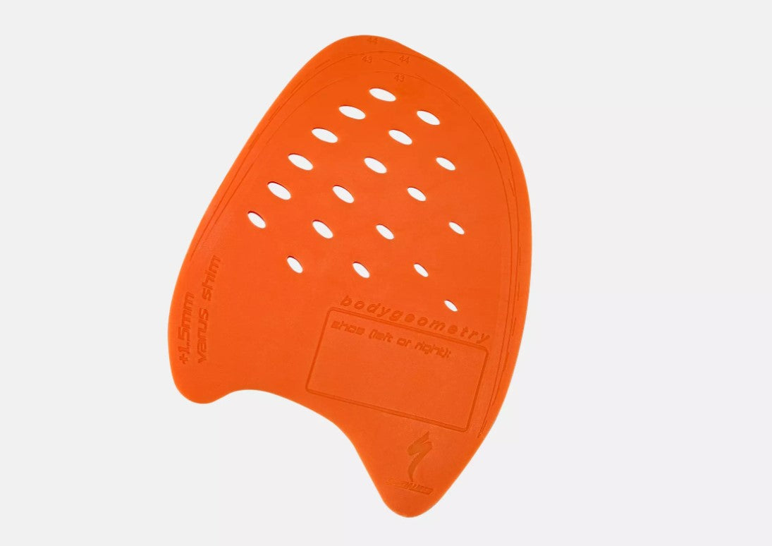 Orange vented Specialized Body Geometry Varus Wedge on a white background.