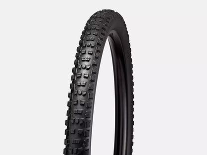 Angled view of black Specialized Eliminator Grid Trail T7 TLR rail tire with tread pattern on a white background.