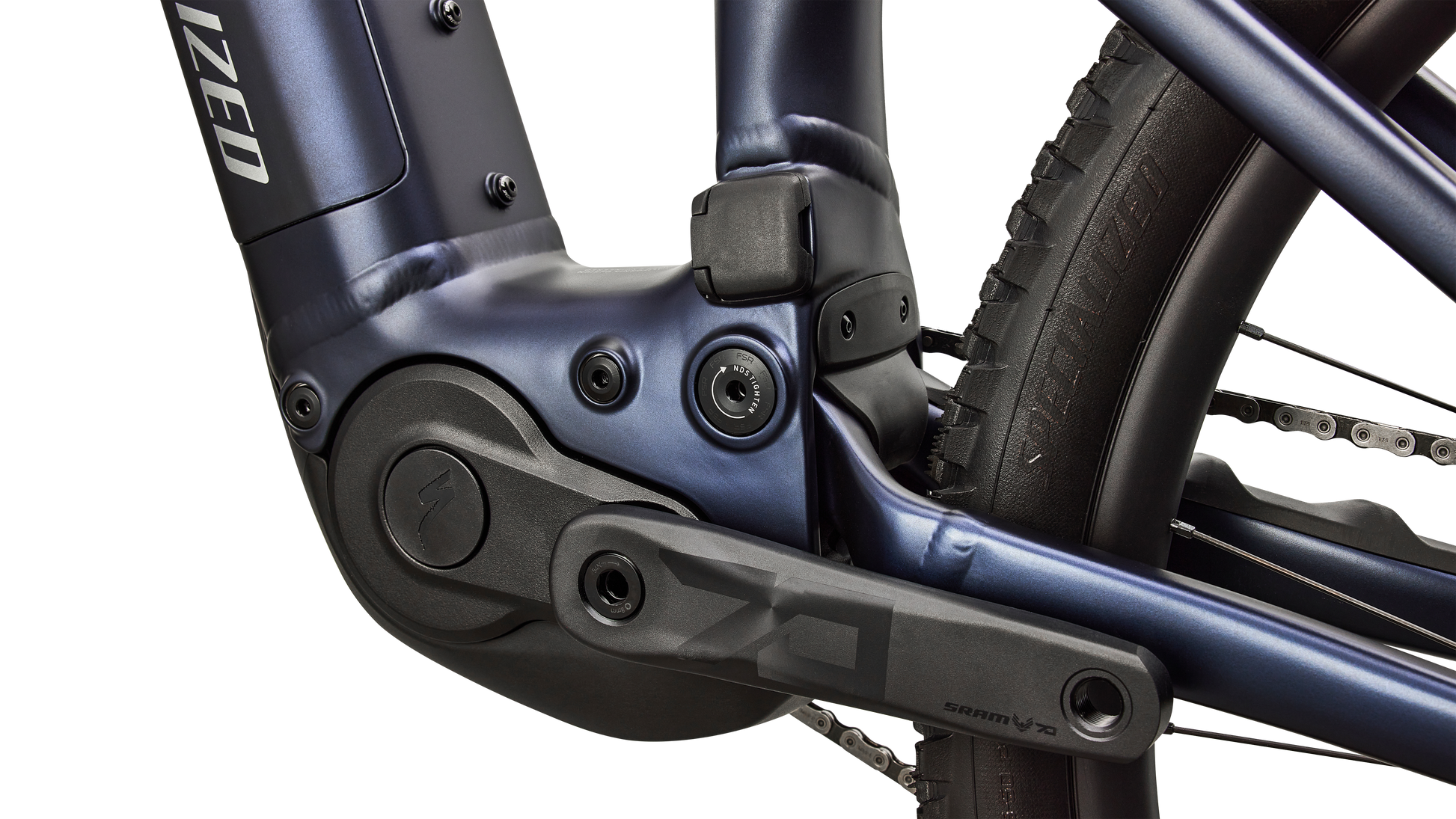 A close up view of the motor and crank of a blue Specialized Levo R Comp Alloy electric assist mountain bike.