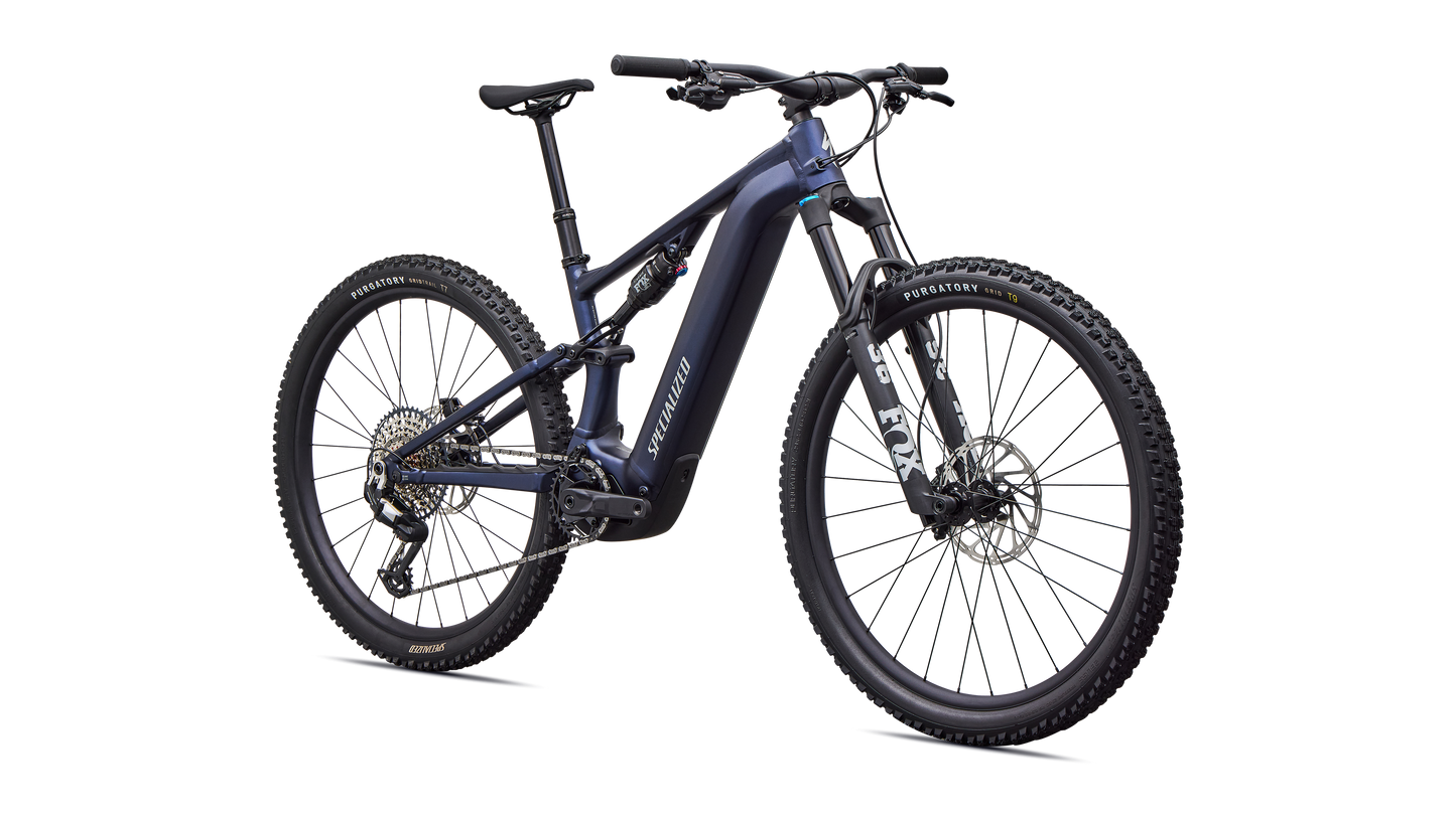 Angled view of blue Specialized Levo R Comp Alloy electric assist mountain bike on white background