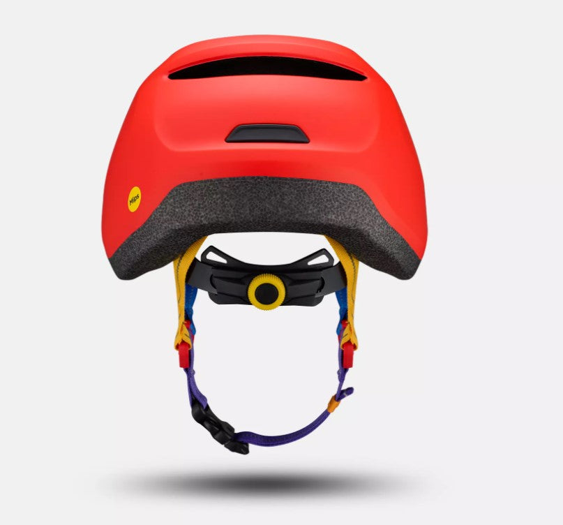 Back view of a red Specialized Mio 2 helmet with colorful straps on a light gray background.