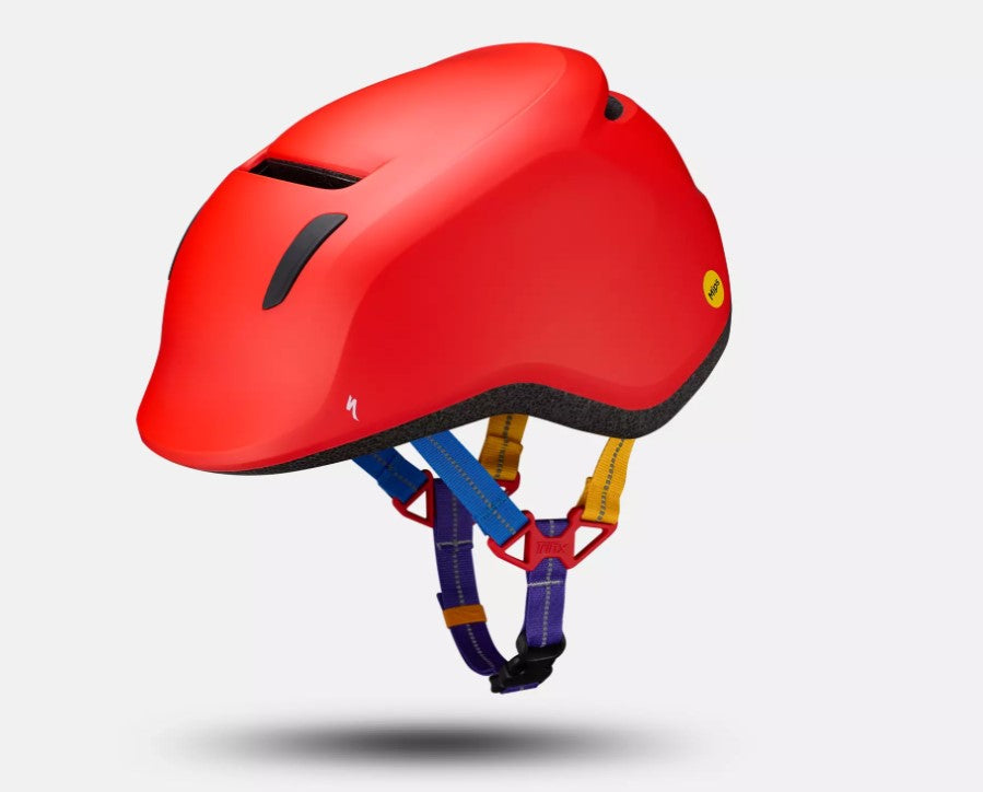 Red Specialized Mio 2 helmet with colorful straps on a light gray background.
