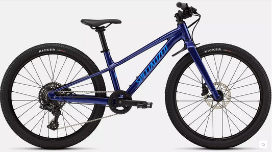Right profile view of blue Specialized Riprock kids mountain bike with black components on a white background. 