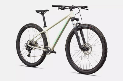 White Specialized Rockhopper Sport mountain bike on a light gray background