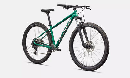 Front right profile of green  Specialized Rockhopper Sport mountain bike with light pink accents on a white background.