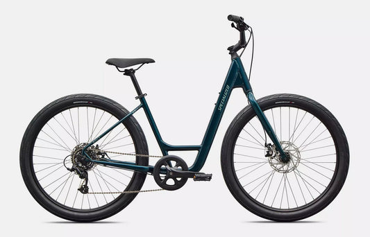 Right profile view of emerald green Specialized Roll bicycle on a white background.