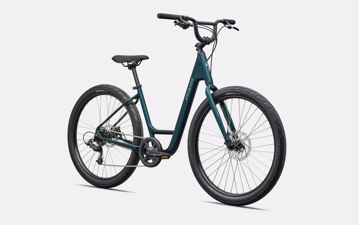 Front right profile view of emerald green  Specialized Roll bicycle on white background.