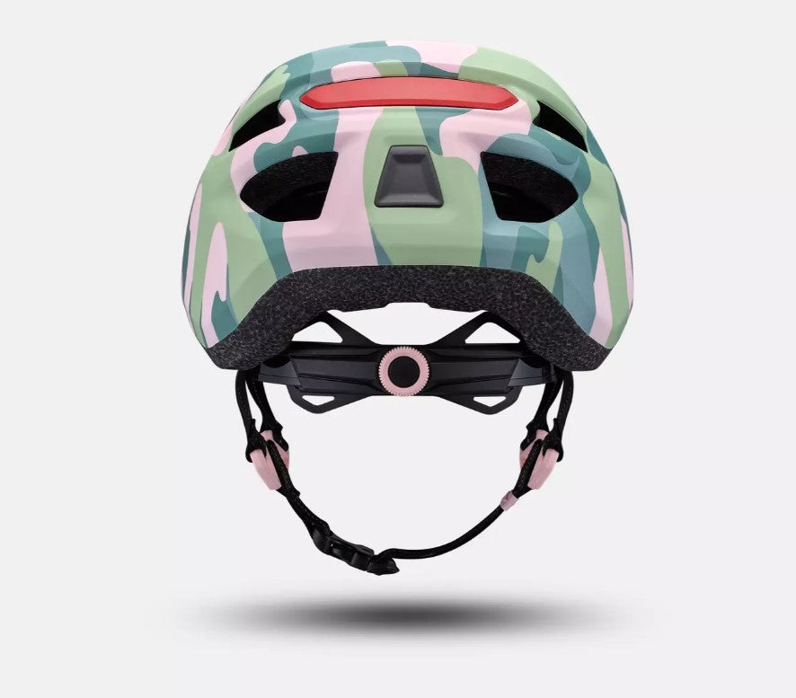 Back view of a pink and green camouflage patterned Specialized Shuffle LED 2 child's bicycle helmet on a white background. 