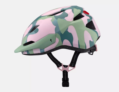 Side view of a pink and green Camouflage-patterned Specialized Shuffle 2 LED child's bicycle helmet  on a white background