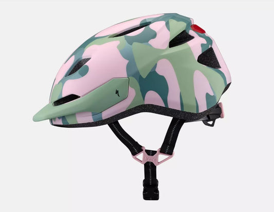 Side view of a pink and green Camouflage-patterned Specialized Shuffle 2 LED child's bicycle helmet  on a white background