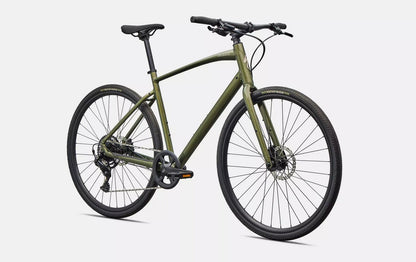 Front right profile view of olive green Specialized Sirrus X bicycle with black components on a white background. 