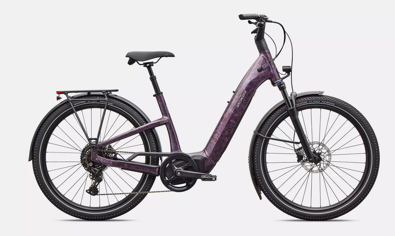 Right profile of purple Specialized Turbo Como electric bicycle on a white background