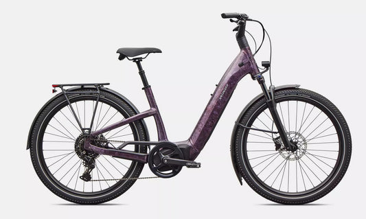 Right profile of purple Specialized Turbo Como electric bicycle on a white background