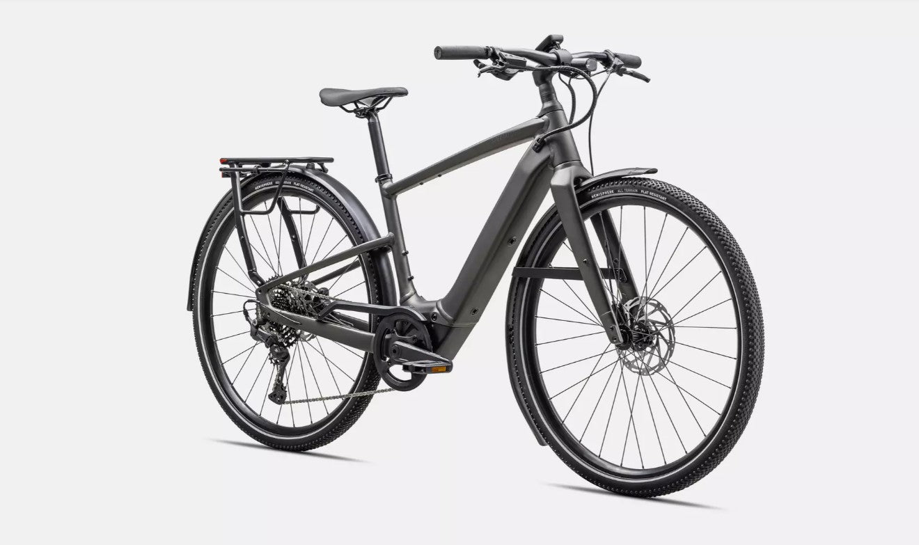 Dark grey Specialized Vado SL electric bicycle with black components on a white background