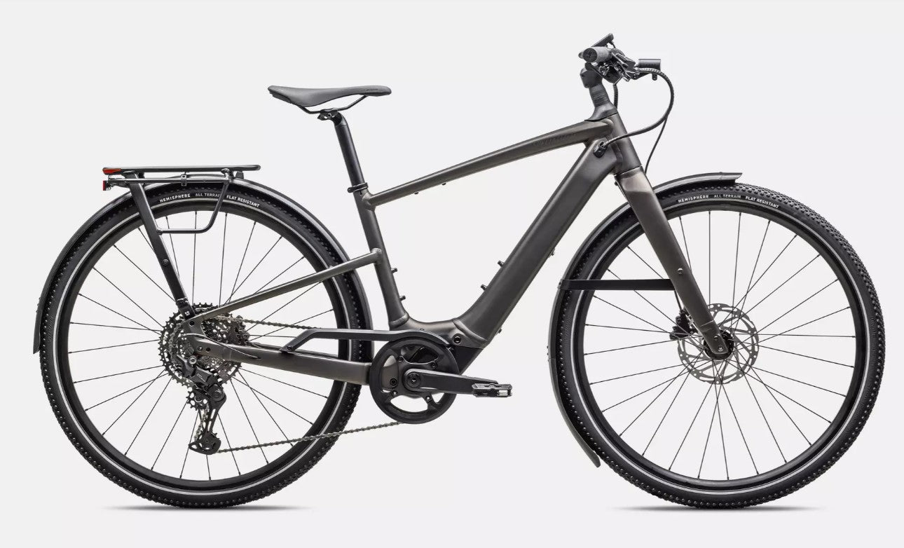 Dark grey Specialized Vado SL electric bicycle with black components on a white background.
