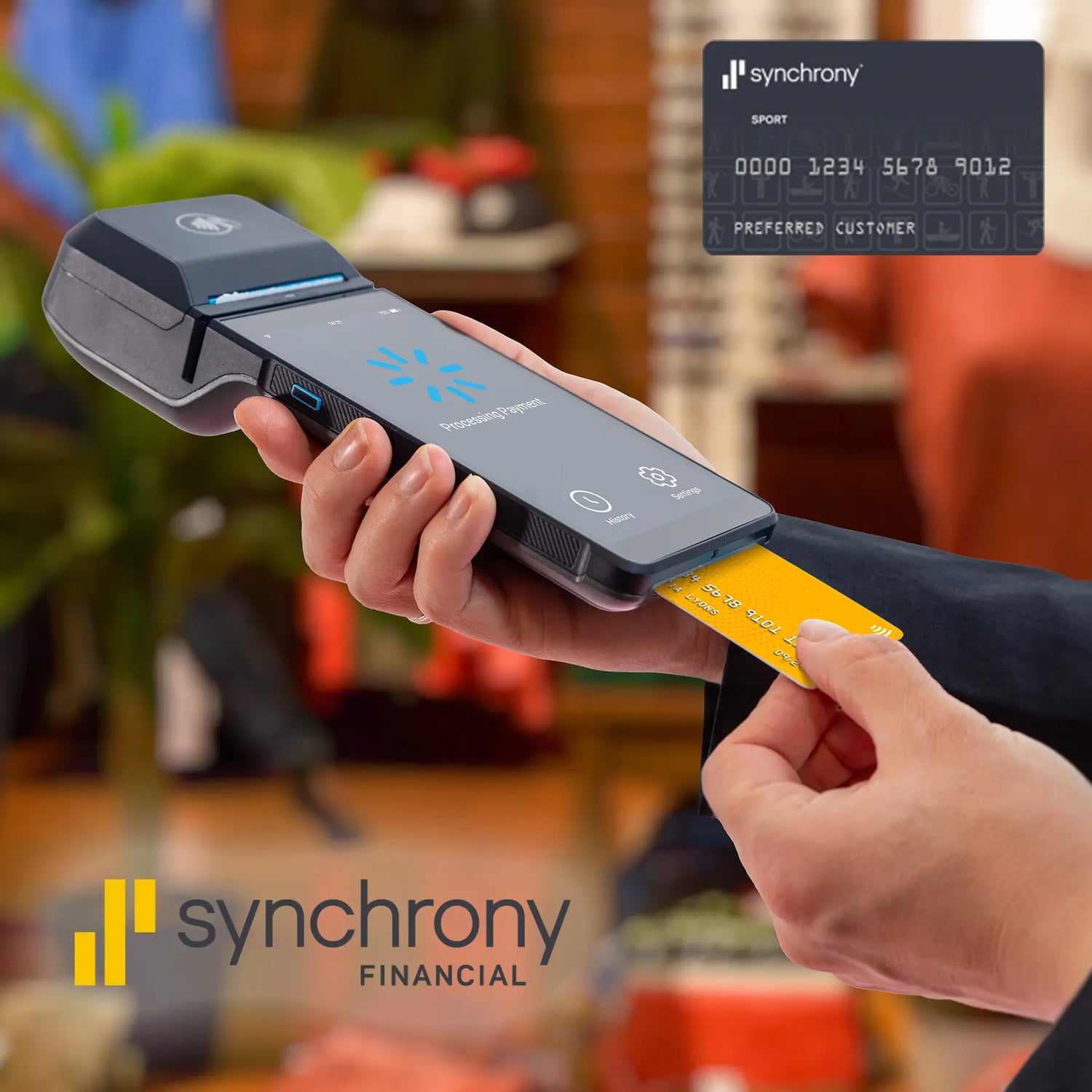 Person using a payment terminal with a card and Synchrony Financial logo.
