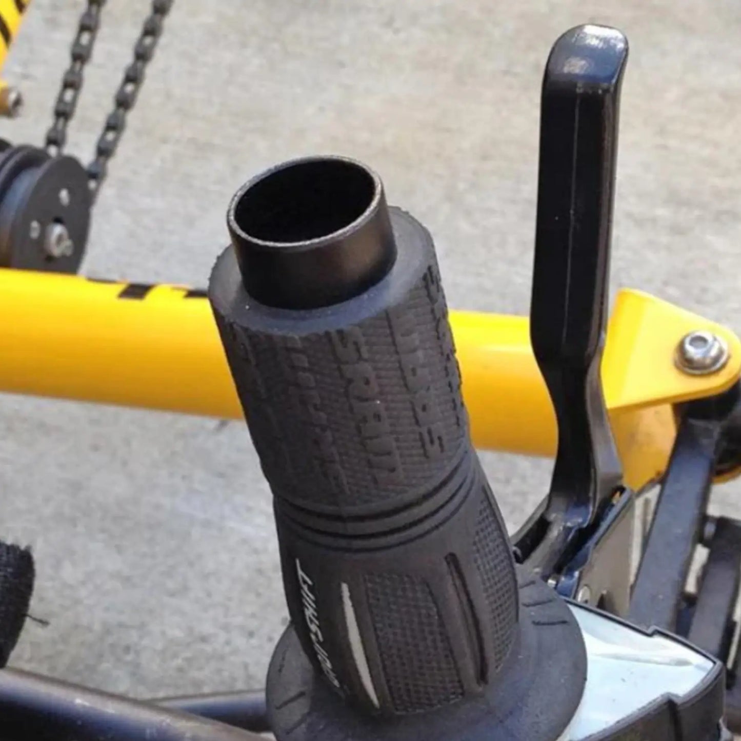 Close up view of how to cut the handlebar grip for the T-Cycle Cockpit Mini T 3.75 inch without cable hole before mounting on a recumbent trike handlebar.