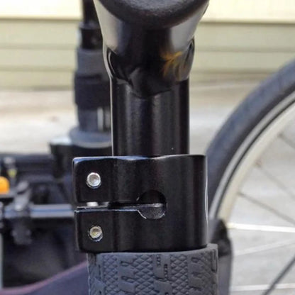 Closeup view of the clamp on the T-Cycle Cockpit Mini T 3.75 inch without cable hole mounted on a recumbent trike handlebar.