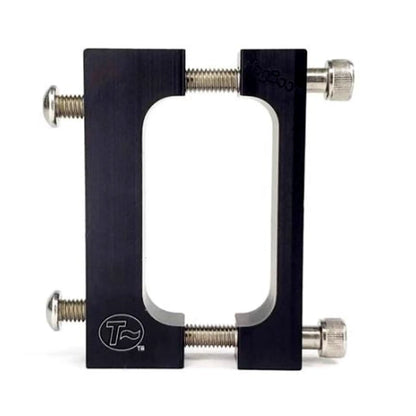 Closeup view of a square clamp for the T-Cycle Configurable Battery Mount against a white background.