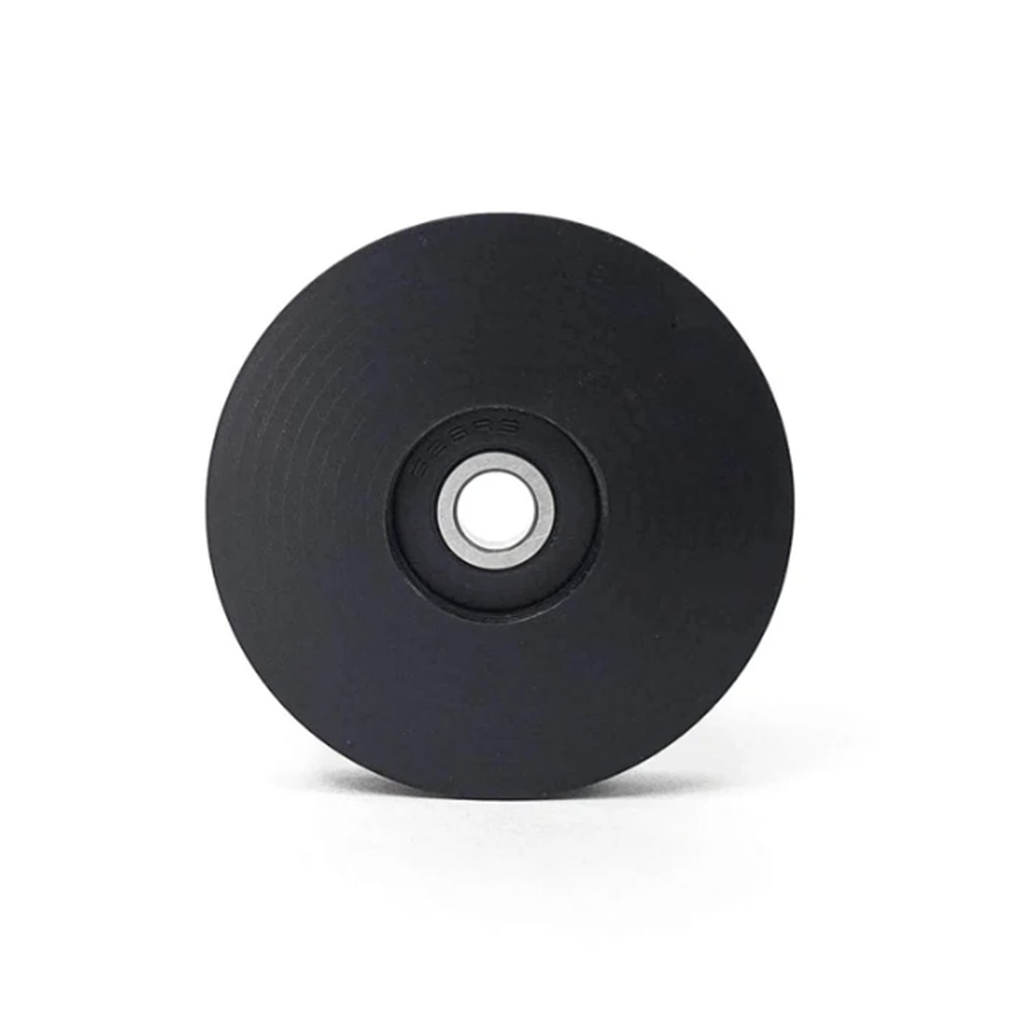 Side view of the T-Cycle Delrin Mini Idler for Tensioners and Volae in black against a white background.