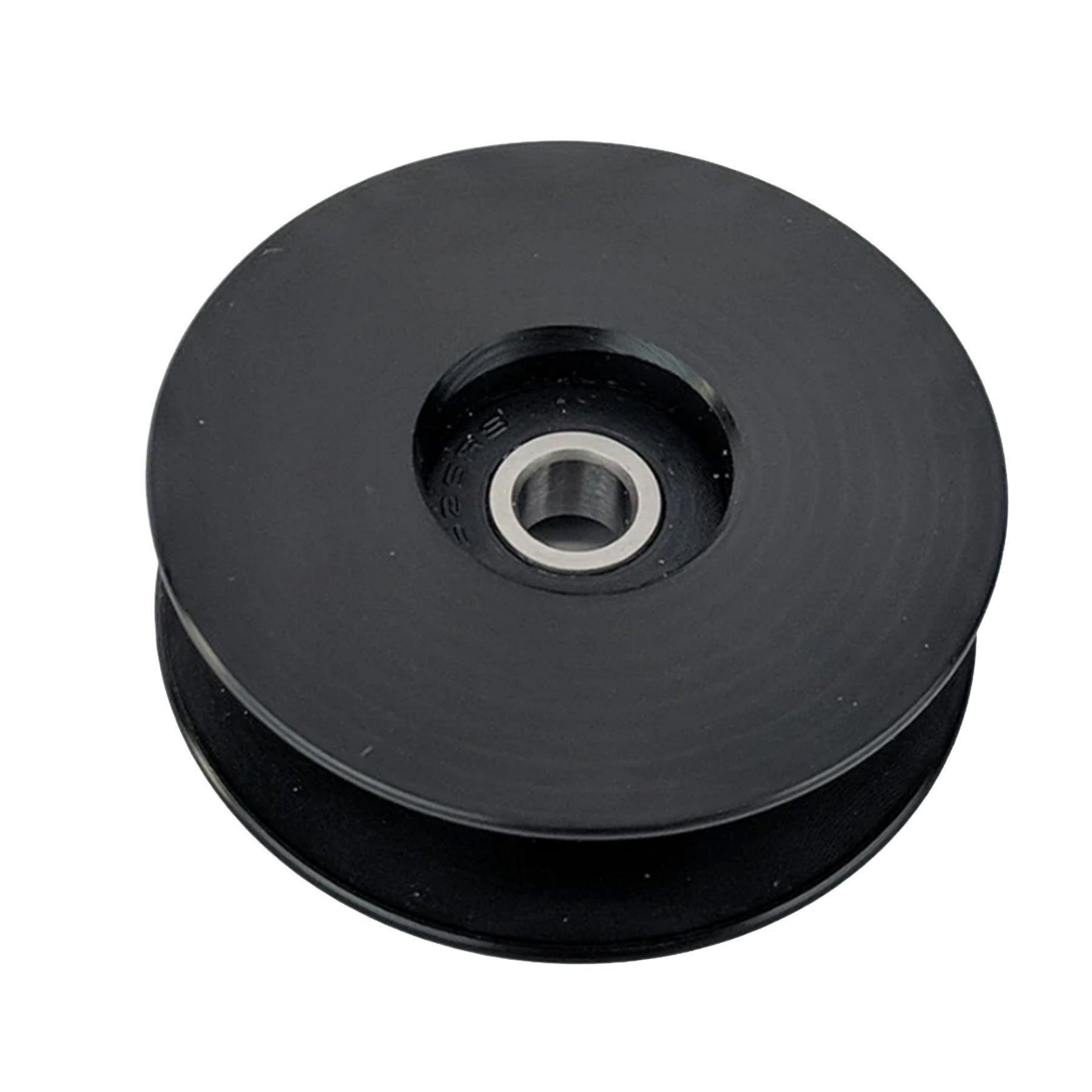 Angled flat view of the T-Cycle Delrin Mini Idler for Tensioners and Volae in black against a white background.