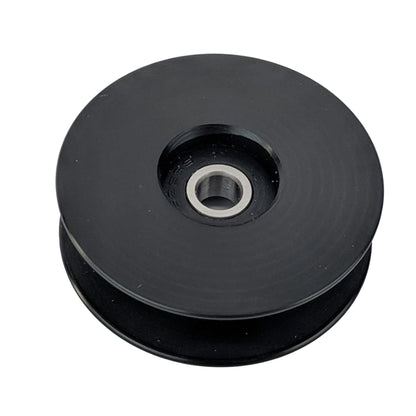 Angled flat view of the T-Cycle Delrin Mini Idler for Tensioners and Volae in black against a white background.