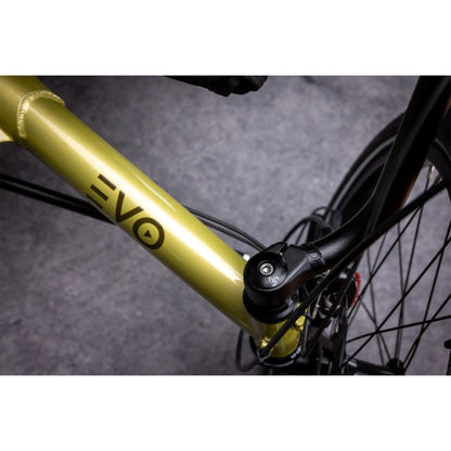 Closeup view of the frame on the TerraTrike E.V.O. Proton Green Recumbent Trike against a gray background.