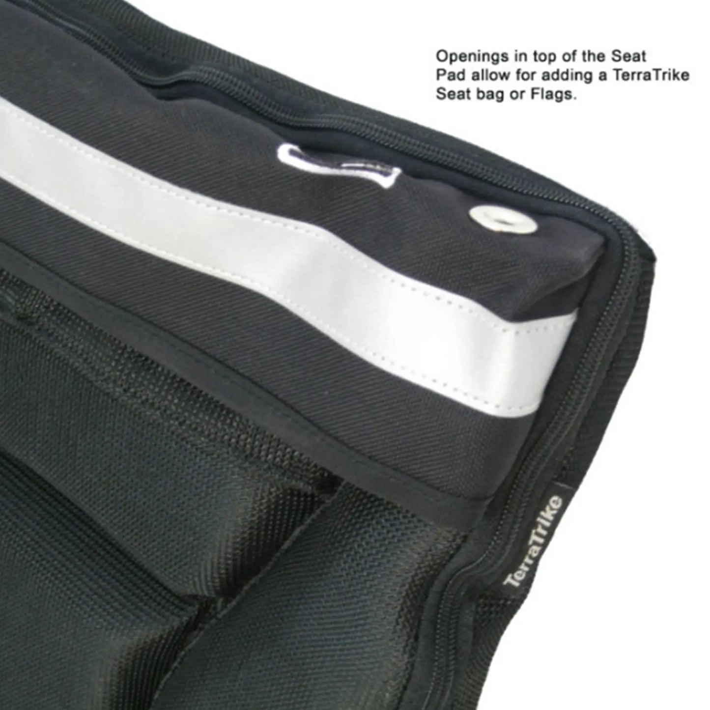 Top view of the black TerraTriike Seat Pad Cushion against a white background with text talking about the seat bag and flag holes.
