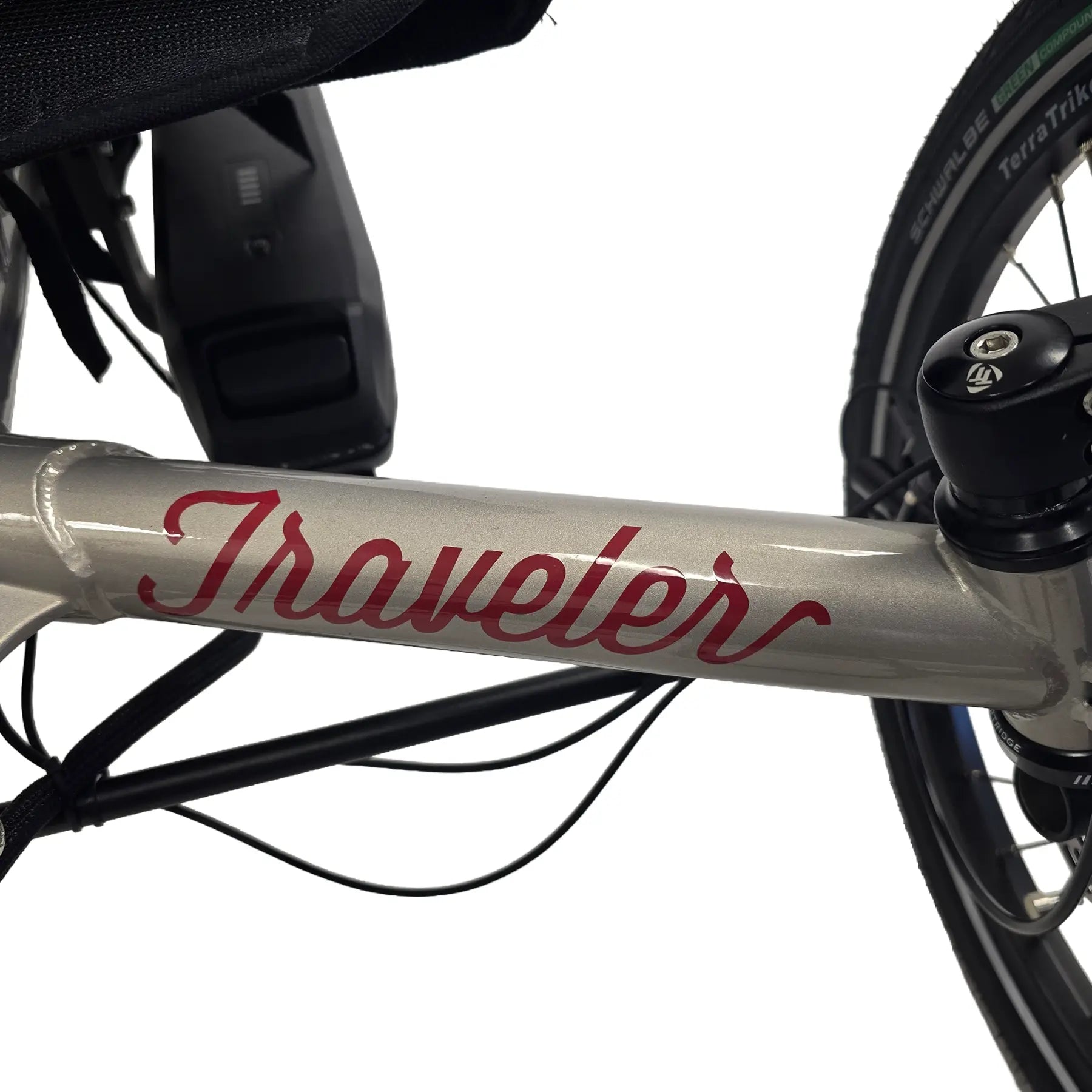 Closeup view of the frame on the TerraTrike Traveler Champagne e-Plus Recumbent Trike against a white background.