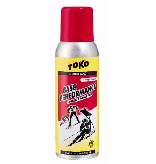 Can of Toko Base Performance Liquid Paraffin Spray Wax 100ml in red against a white background.