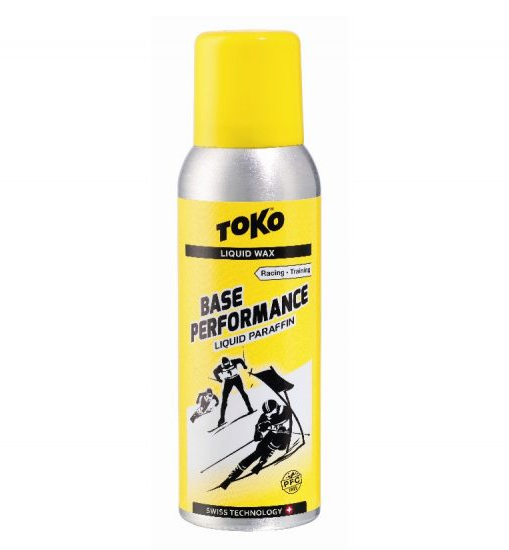 Can of Toko Base Performance Liquid Paraffin Spray Wax 100ml in yellow against a white background.
