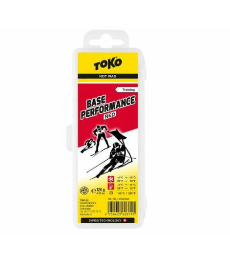 Toko hot wax packaging with red and yellow design on a white background.