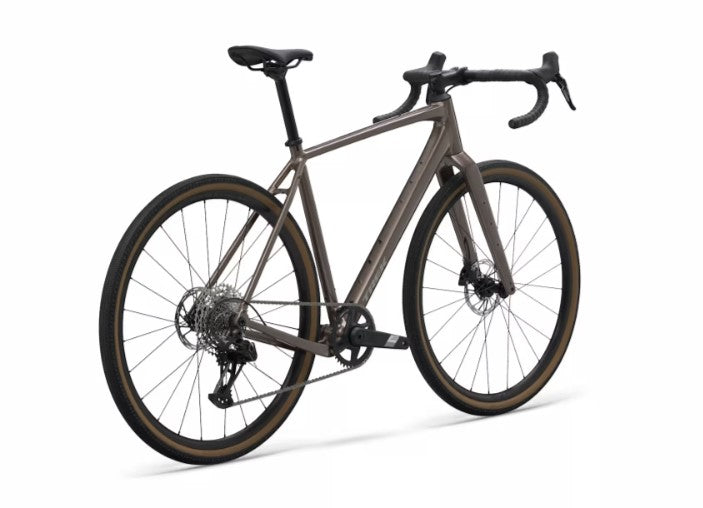 Angled view of a bronze Trek Checkpoint ALR 5 with black components on a white background. 
