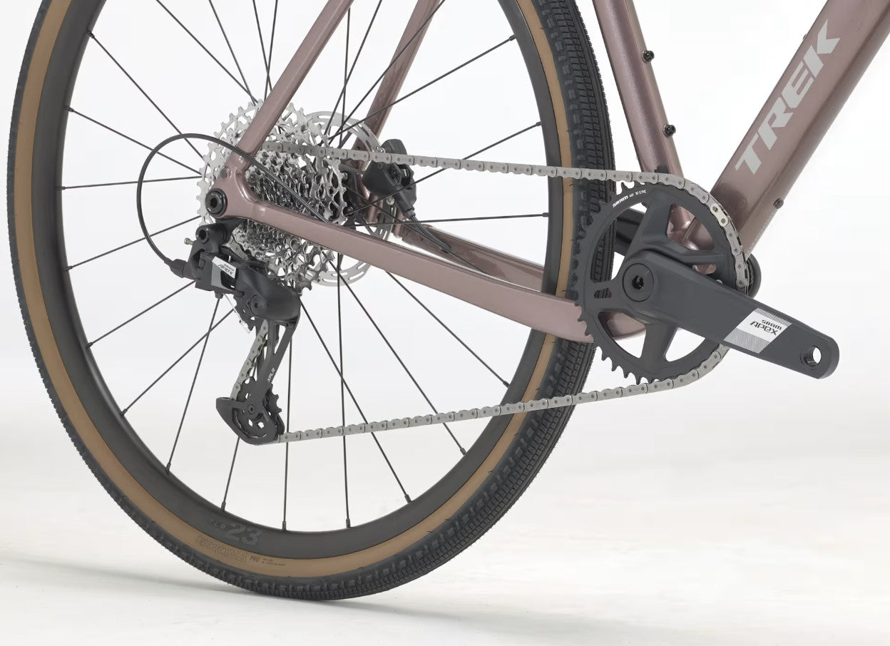 Close-up of a bronze Trek Checkpoint ALR 5 drivetrain on a white background
